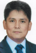 Profile photo of a man in a suit.